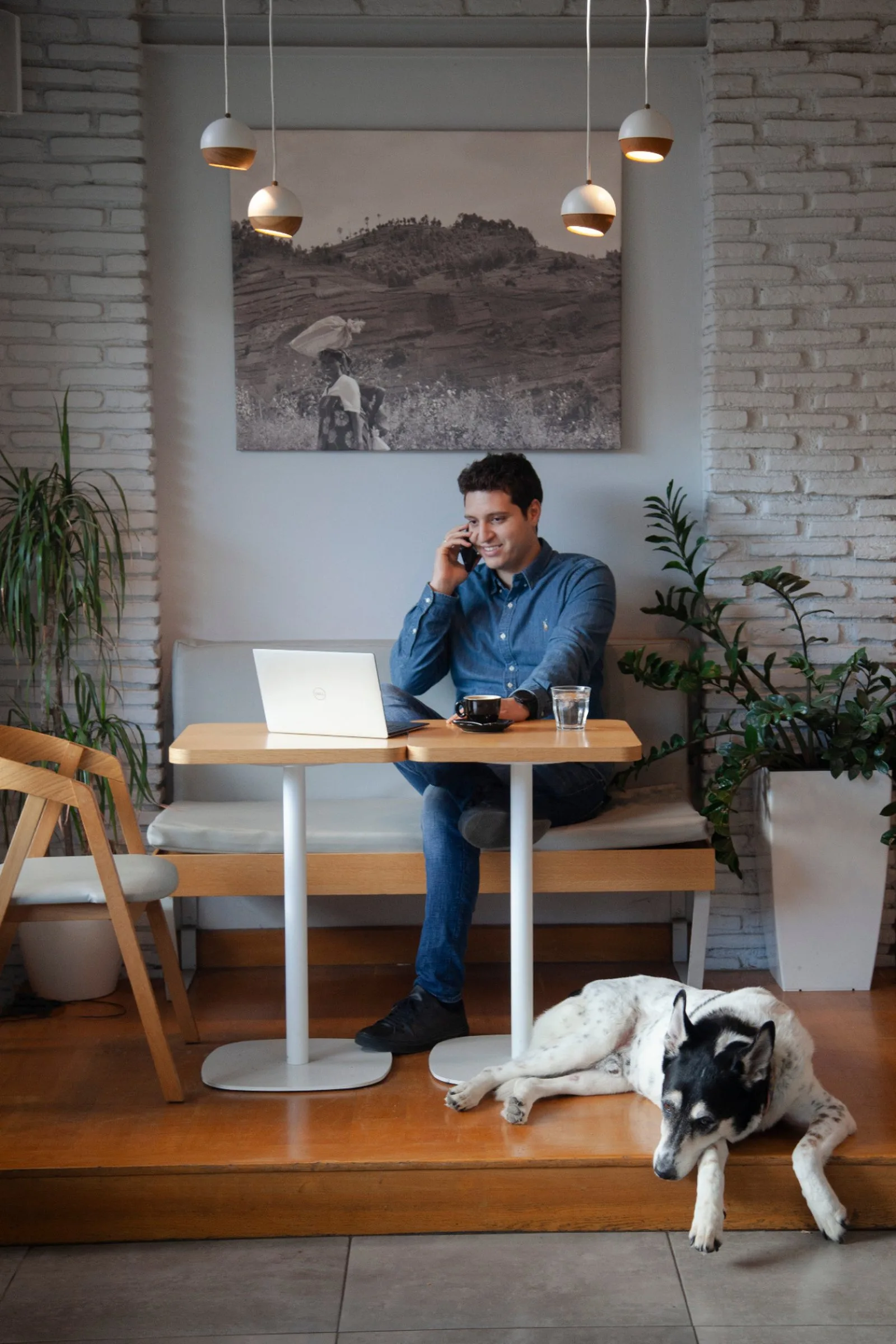 Panos working from an Athens cafe